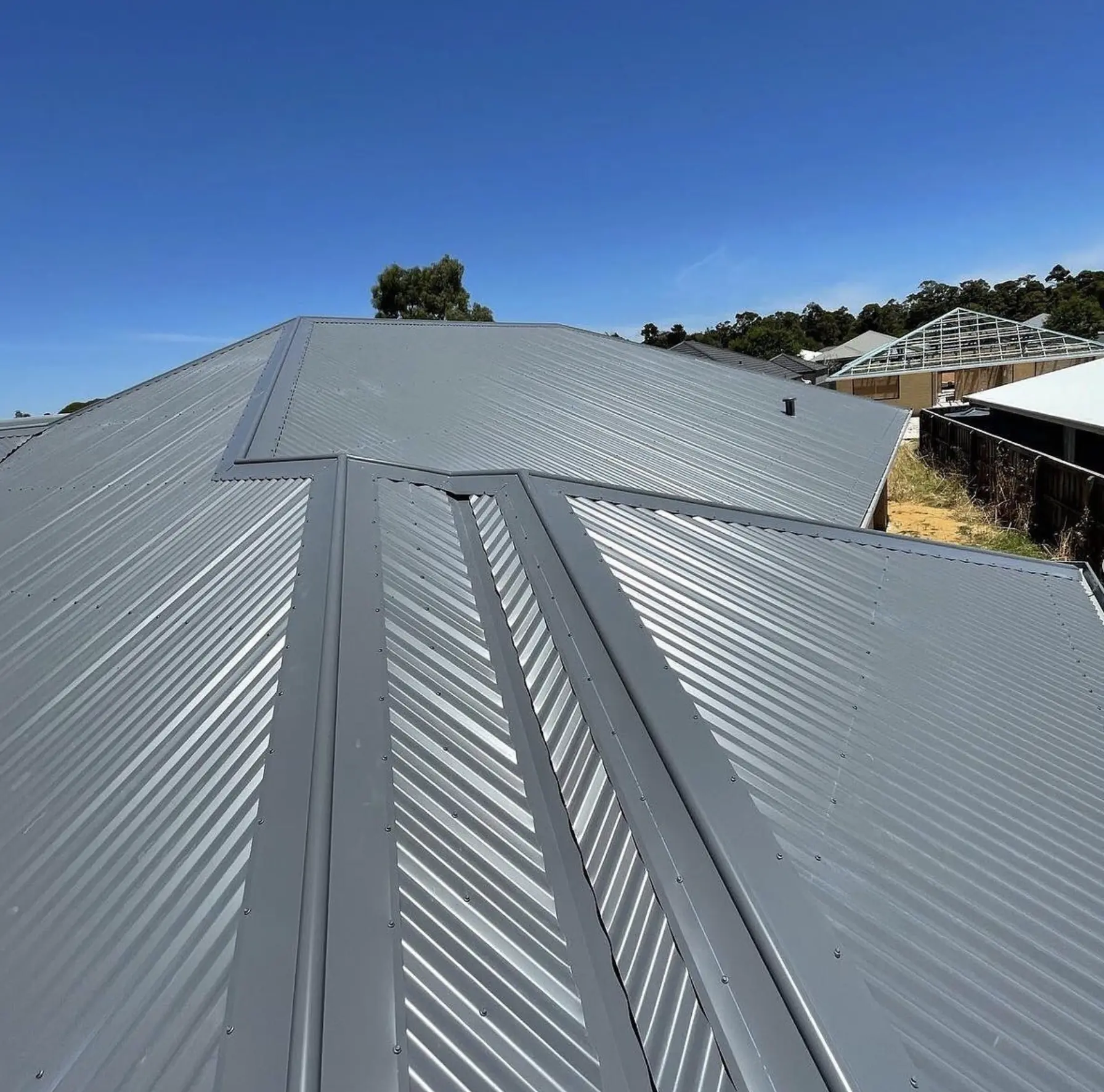 Corrugated roofing cleaning