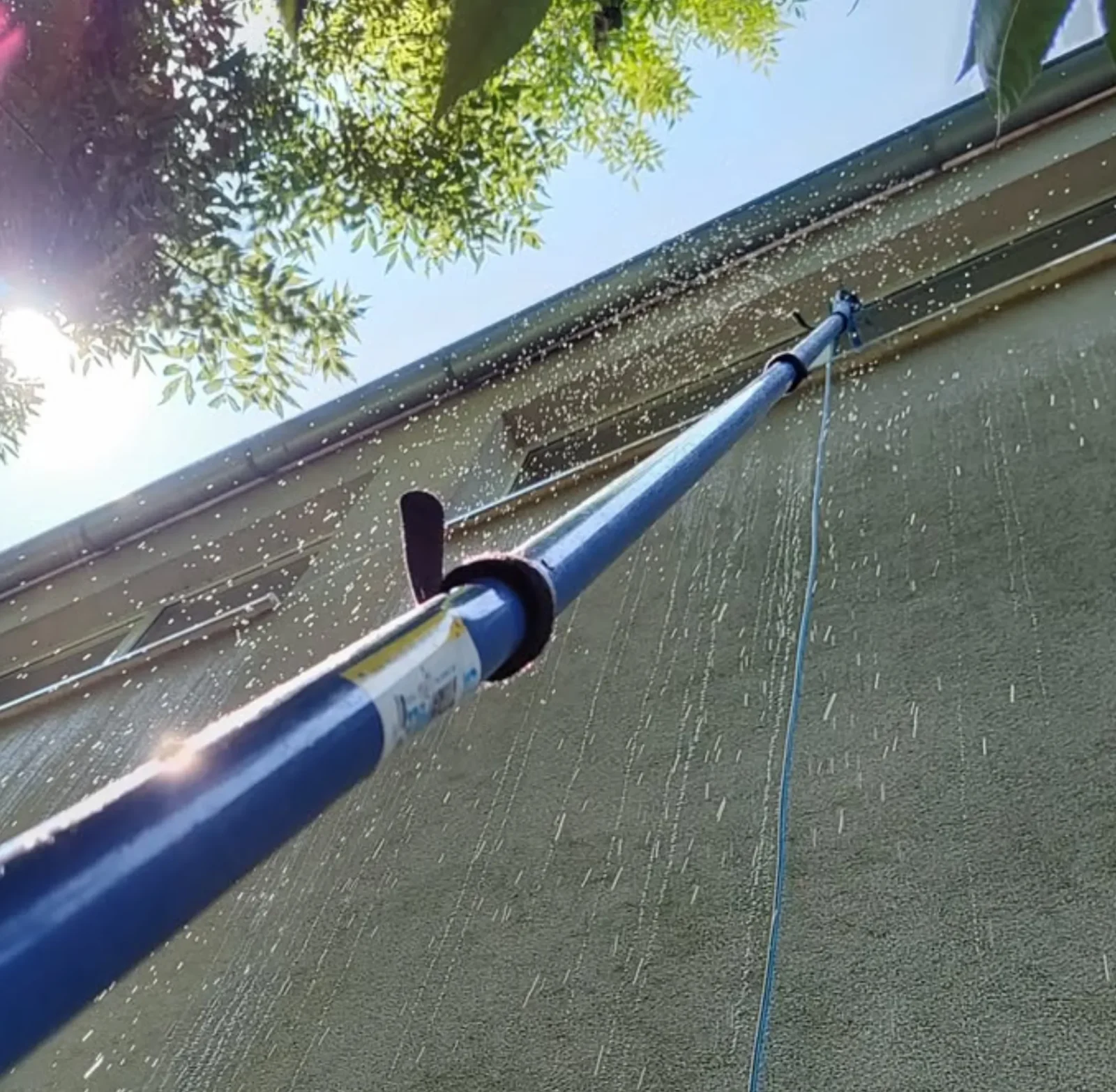 Fascia board cleaning with soft brush