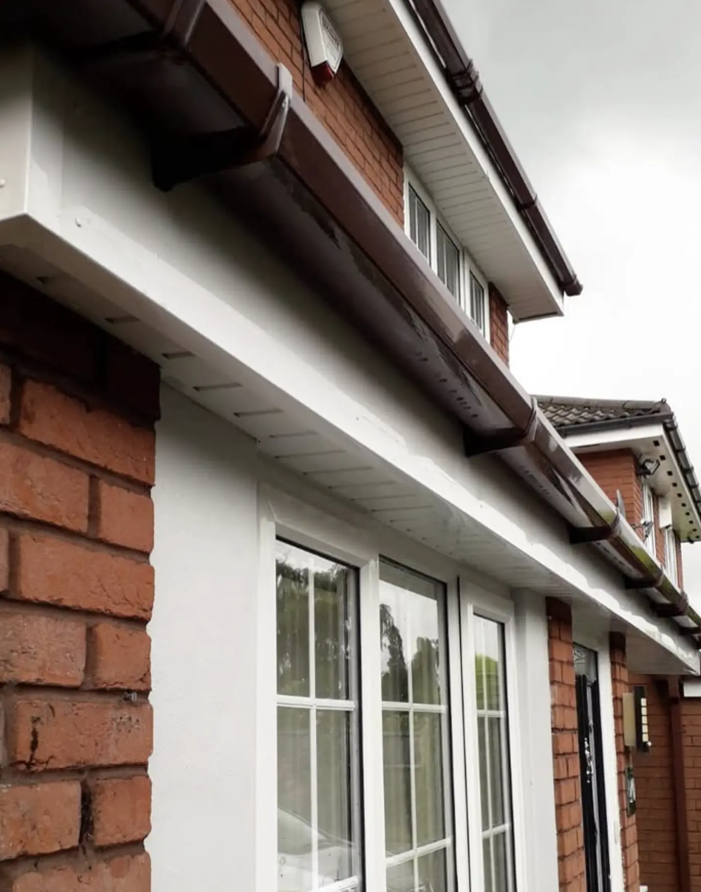 Grimy fascia before and after cleaning