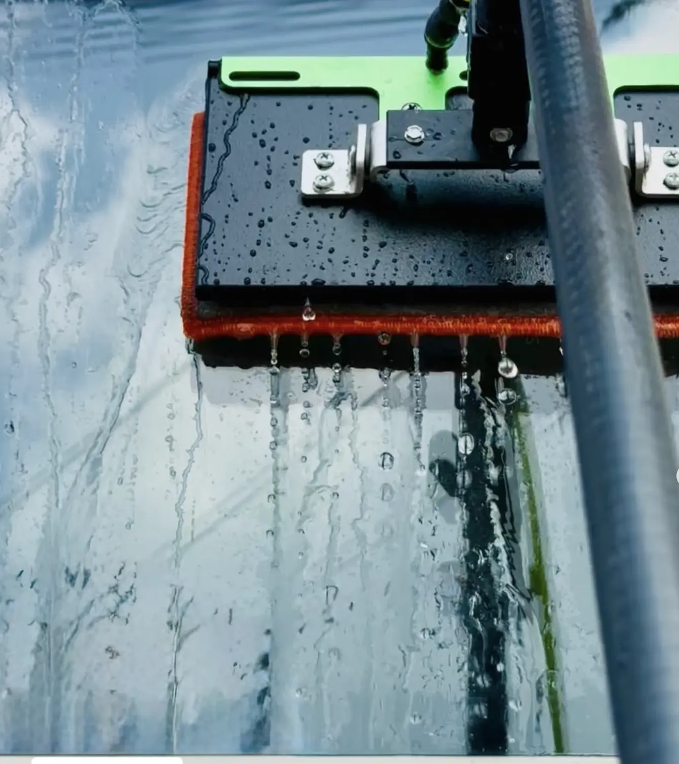 Water-fed pole system cleaning high-rise windows
