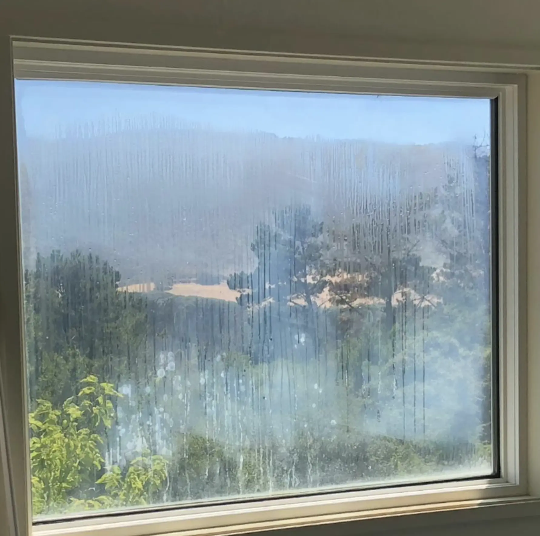 how to fix hazy window glass