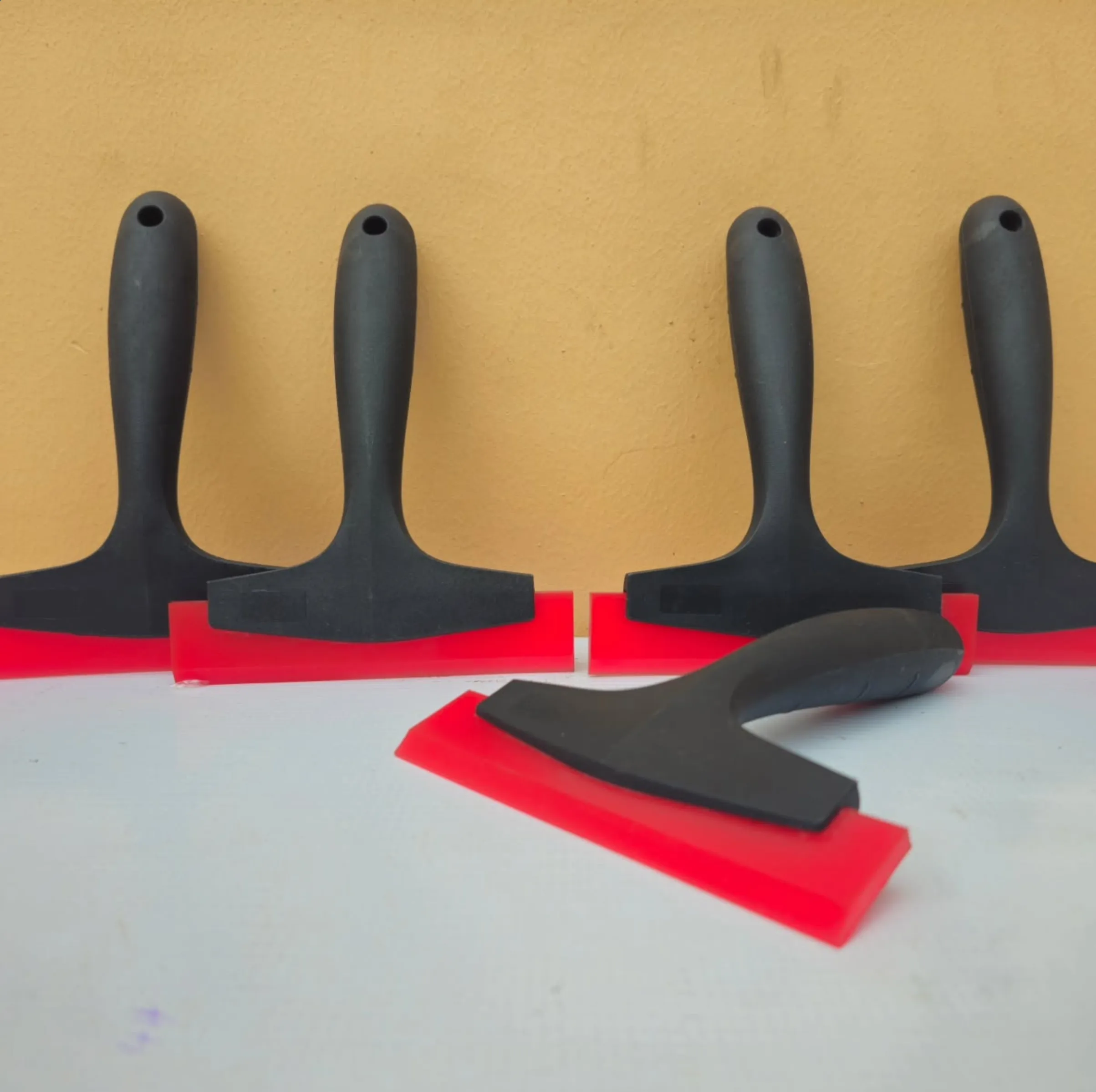 rubber squeegee vs silicone